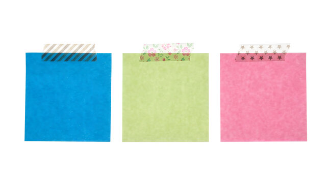 Three colorful sticky notes with decorative tape isolated on white background