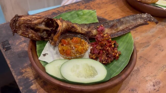 Indonesian Fried Catfish Pecel Lele with Chili Sambal and Cucumber