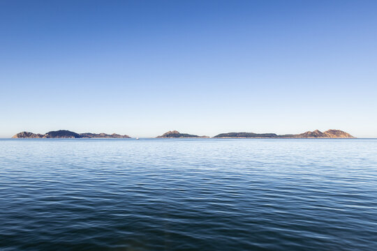 Scenic sunrise panoramic view of the Cies Islands Natural Park from the Atlantic Ocean in Galicia Spain