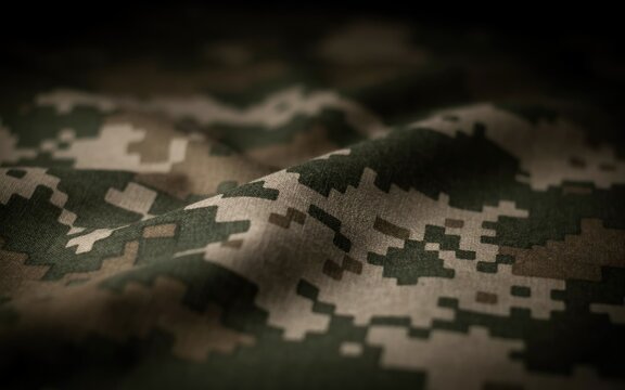 Macro close-up of digital camouflage fabric with folds and shadows
