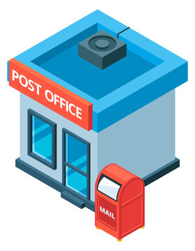 A post office building with a red mailbox in front of it