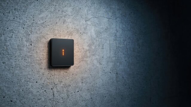 Square black light switch with glowing orange indicator on a textured concrete wall