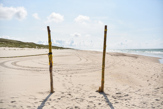 Tire Tracks in the Sand of the Borderland Between EU Member State Lithuania and the Russian Enclave of Kaliningrad by the Baltic Sea