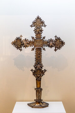 Christian religion. A Gothic-Plateresque processional cross with fleur-de-lis ends and repouss&eacute; relief work.