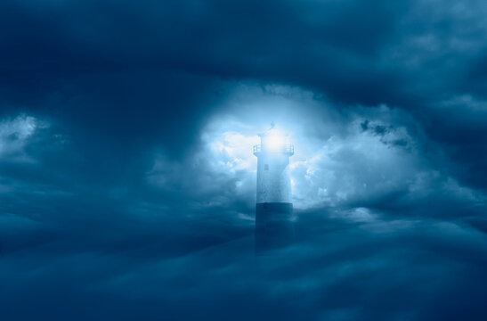 Night sky with lighthouse with stormy sky at dark night 