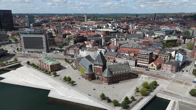 Aerial view of Toldboden, the historic Customs House, and Aarhus cityscape on a sunny day in Denmark.