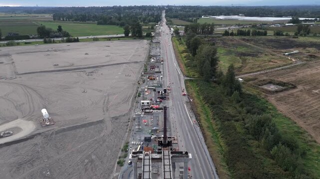 Aerial View Of The Surrey Langley SkyTrain Project Construction (Dave Barrett Extension) Along The Fraser Highway Corridor In British Columbia, Canada.