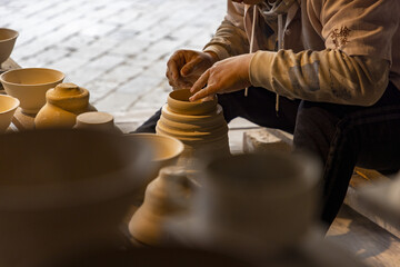 Potter Handcrafting a Ceramic Bowl in a Traditional Workshop © MaiVan