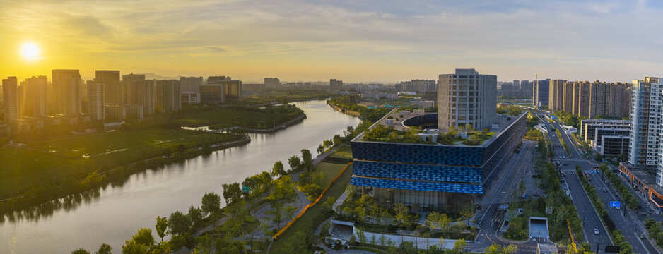 Sunset aerial view of modern riverside district in Hangzhou, China