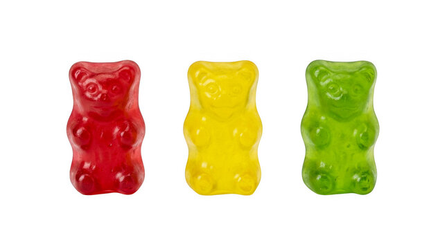 Three colorful gummy bear candies in red yellow and green colors isolated on transparent background