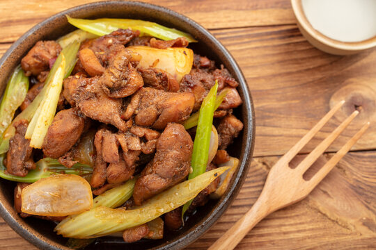 Braised Chicken with Celery and Onion in a Rustic Bowl