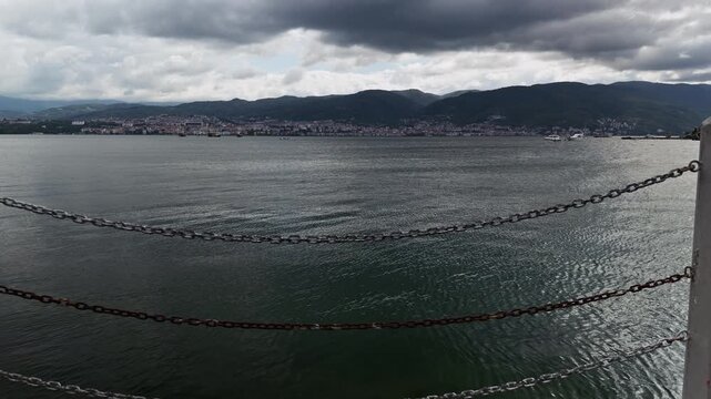 Boats on Izmit Gulf Behind Blurred Iron Chains