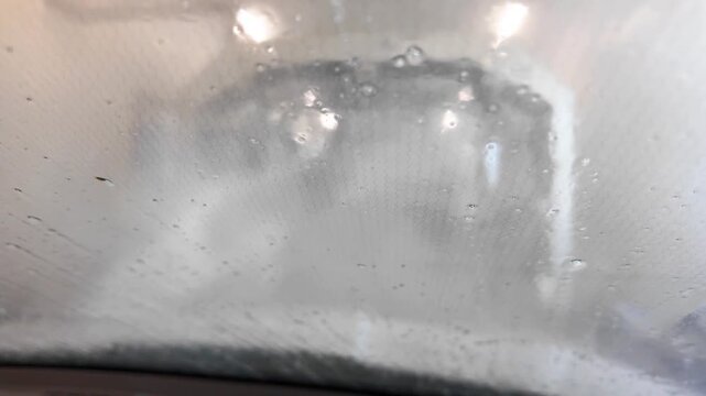 Vehicle Passing Through Automated Car Wash System