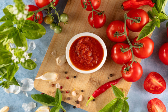 Tomato paste. Fresh tasty tomato sauce with ripe tomatoes and basil