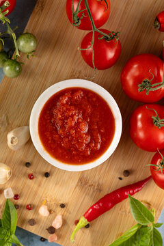 Tomato paste. Fresh tasty tomato sauce with ripe tomatoes and basil