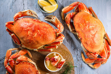 Platter of King Crabs with Butter and Lemon © Maria
