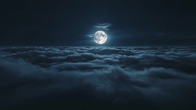 Full moon shining brightly above a dense layer of dark night clouds captured in motion video footage