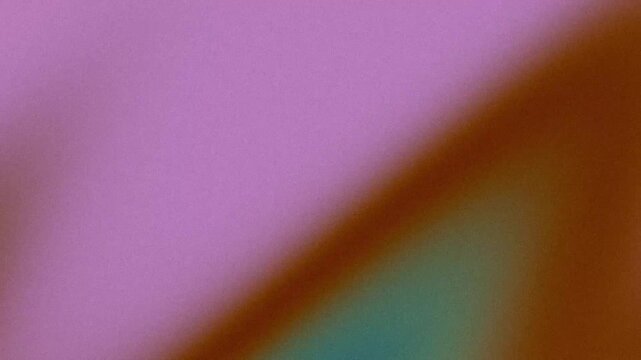 Grainy pink and brown abstract gradient background with soft texture