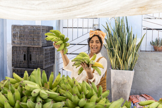 Mature Woman 50+ Exploring Local Food Market, Shopping Fresh Tropical Fruits During Authentic Travel Experience