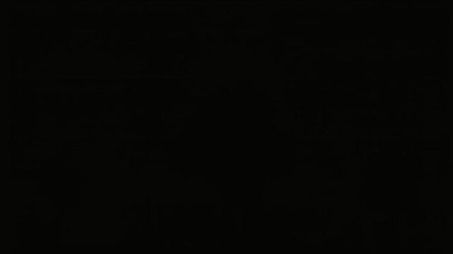 Funny white cartoon ghosts floating happily against dark black background in humorous spooky animated video footage clip