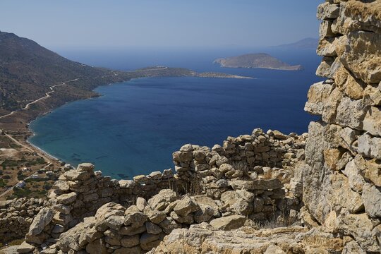 Panoramic view of a coast with a blue sea surrounded by ancient ruins and islands, Johanniter fortress from the 14th century AD, fortress of Megalo Chorio, Kastro, Megalo Chorio, Zero Waste Island, Tilos, Dodecanese, Greek Islands, Greece