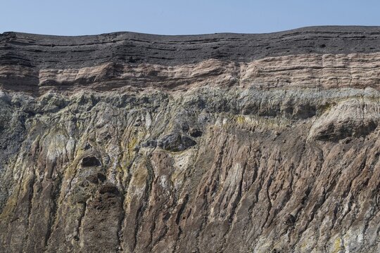 Crater rim with various layers, formed during previous eruptions, Vulcano, Aeolian or Lipari Islands, Sicily, Southern Italy, Italy