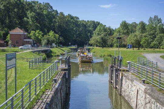 Houseboat passes through Batuv Canal lock, Str&aacute;žnice, Jihomoravsk&yacute; kraj, Czech Republic