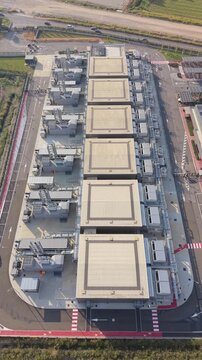 Aerial view of a large data center campus in Milan, highlighting the scale of technical infrastructure supporting reliable computing, business continuity and mission-critical digital operations.