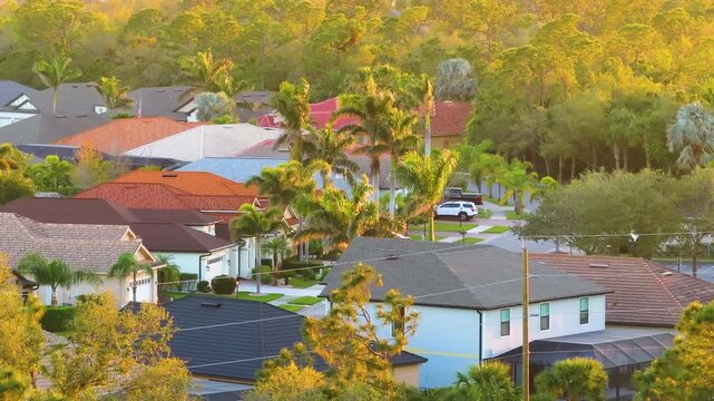 Wealthy residential area in USA suburbs. Rich neighborhood with expensive suburban homes in southwest Florida.