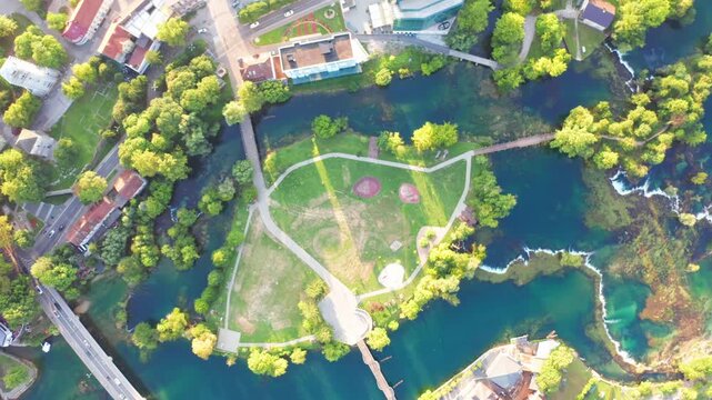 High altitude aerial view of Bihac cityscape and Una River nature