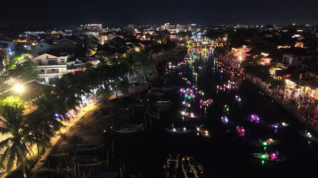 Dramatic aerial view of historic Hoi An town illuminated