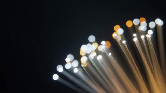 Soft Fiber Optic Lights on a Dark Empty Background