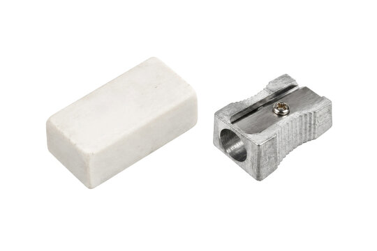 White rectangular rubber eraser and a silver metal pencil sharpener are isolated on a clean white background