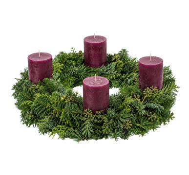 Traditional Advent wreath with four unlit purple candles and fresh green fir branches on a clean white background