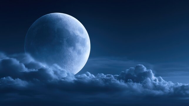 Serene night sky with a large luminous moon rising above soft clouds, creating a tranquil and mystical atmosphere in deep blue tones