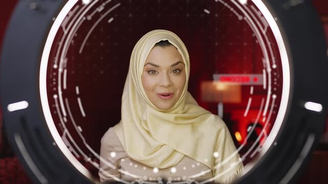 POV of happy Arab blogger recording video for social media on smartphone