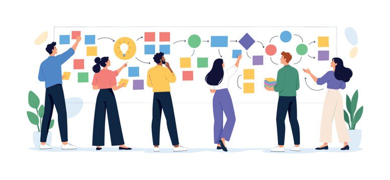 Creative team collaborating on a project strategy using colorful sticky notes on a large whiteboard