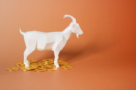 chinese new year card, Chinese New Year, year of the goat. Chinese goat on a red background, with copy space 2027, golden goat