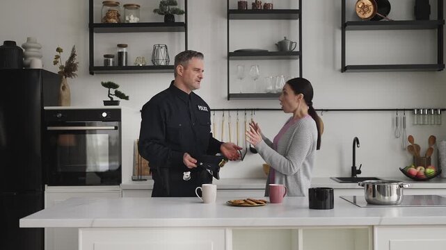 Displeased wife confronts police officer husband about his constant work shifts