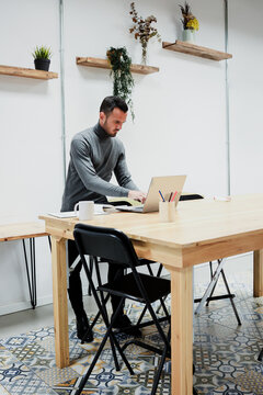 hispanic adult businessman working at office