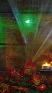 Spooky halloween decorations with pumpkins and skeleto