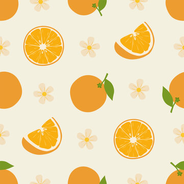 Handdrawn orange fruit and blossom seamless pattern with citrus slice and green leaf motifs