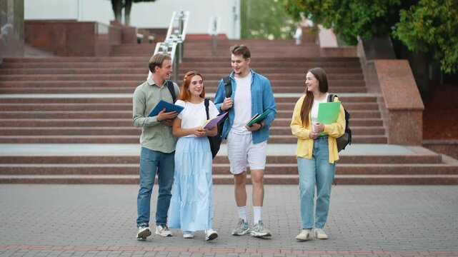 University students walking and talking on campus