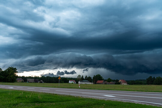 Dramatic and dangerous shelf cloud of an approaching severe thunderstorm during a hot summer day.