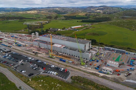 Aerial view of the Green Mountain SVG-Undheim data center construction site with cranes and heavy machinery in a rural landscape in Undheim, Rogaland, Norway.