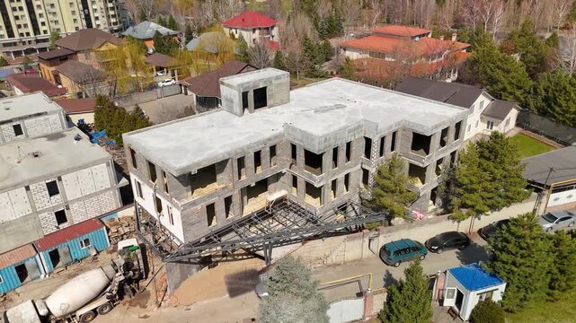 Aerial View of an Unfinished Building in an Urban Neighborhood
