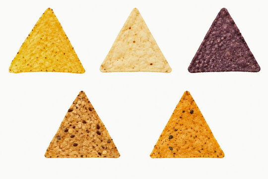 A set of triangular nachos. Yellow Corn and White Corn and Blue Corn and Multigrain and Grain-Free chips isolated over a white background
