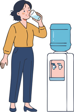 Young woman drinking water from a glass, standing next to a water cooler in an office.