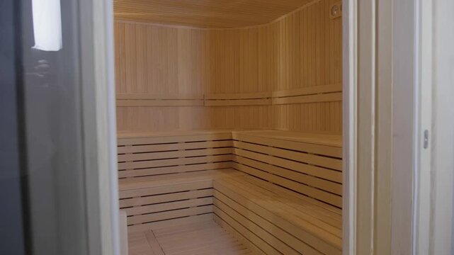 Luxury wellness spa interior featuring traditional marble Turkish bath hamam and modern wooden sauna room3