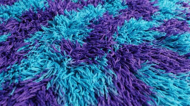 Waving plush monster in turquoise and purple colors shows softness